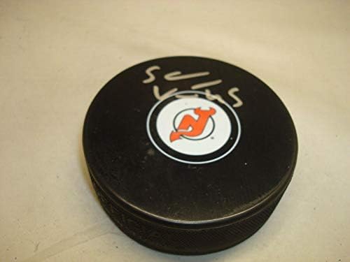Самите Vatanen подписа хокей шайба в Ню Джърси Дэвилз с автограф 1А - за Миене на НХЛ с автограф