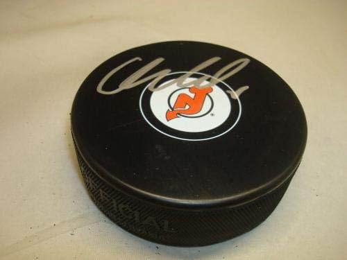 Кори Шнайдер подписа хокей шайба в Ню Джърси Дэвилз с автограф 1А - за Миене на НХЛ с автограф
